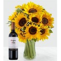 Florero de Vidrio con 10 Girasoles y Botella de Vino Tinto